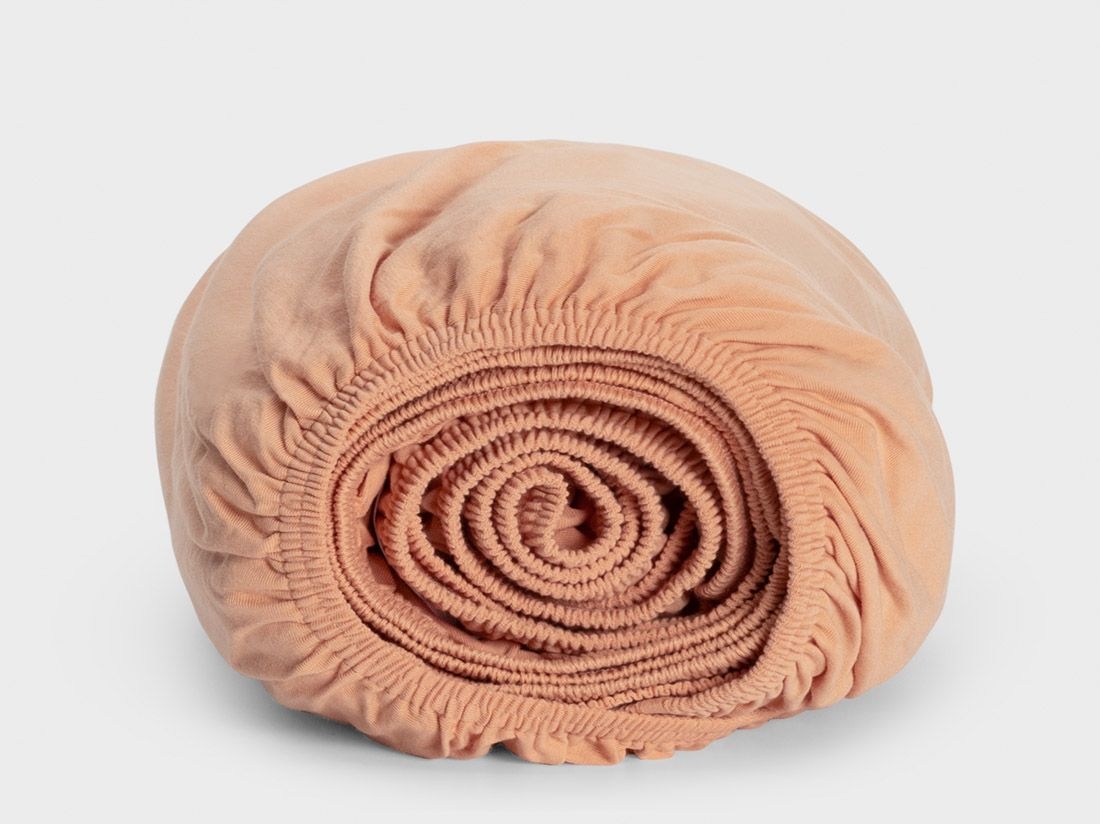 Dra på-lakan jersey perfect peach