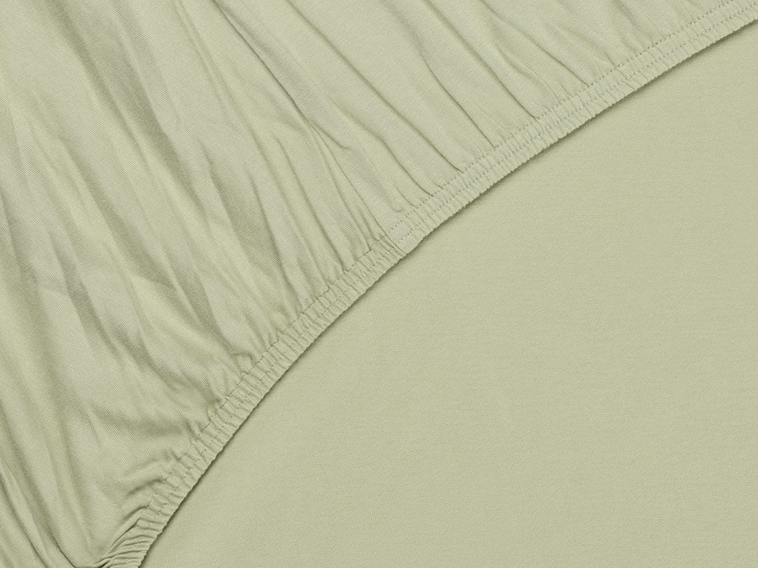 Dra på-lakan jersey pistachio green