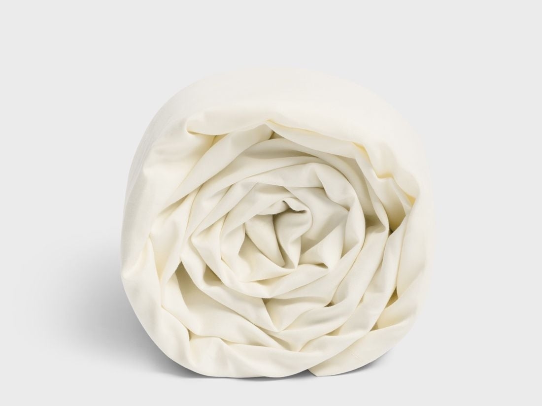 Barnlakan bomullssatin warm white feather