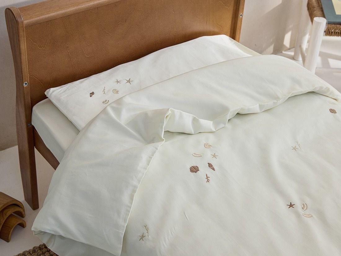Påslakan för barn bomullssatin warm white seashell