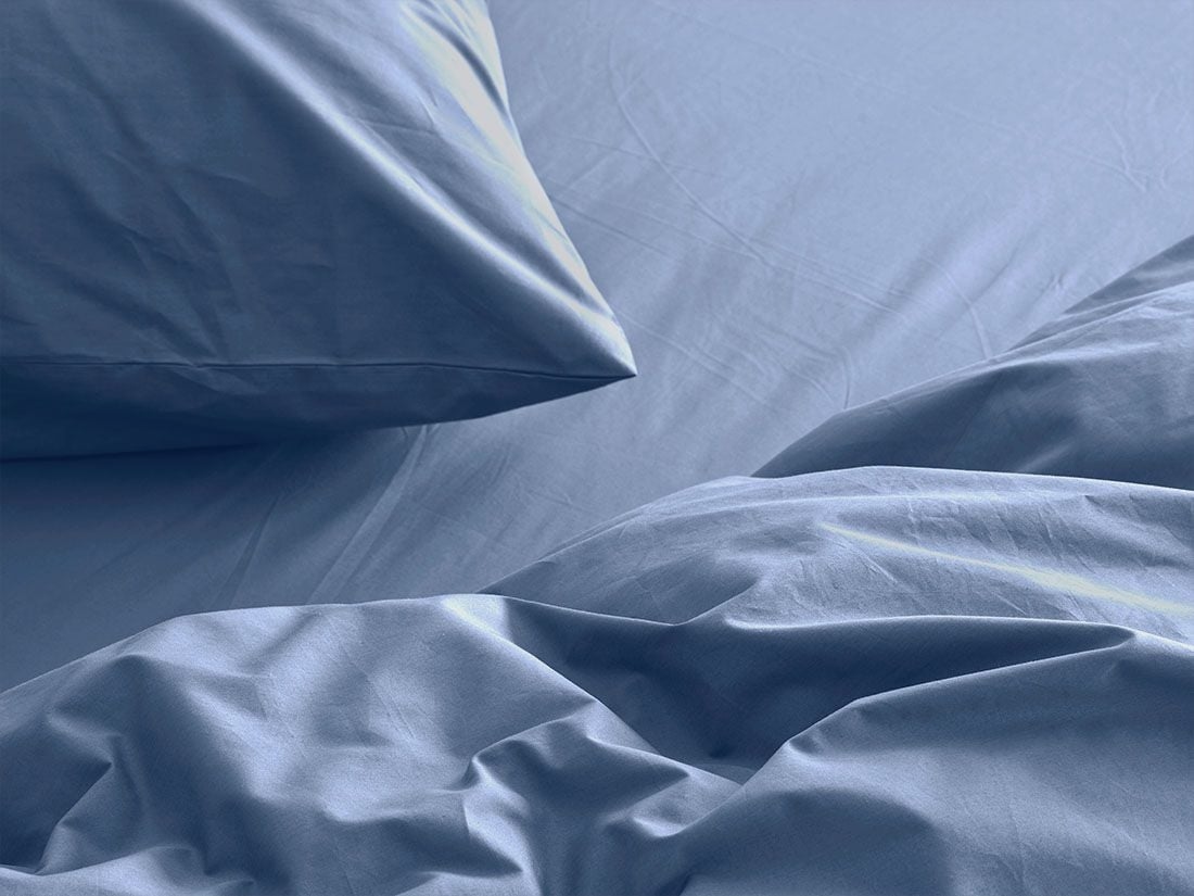 Dra-på-lakan percale serene blue