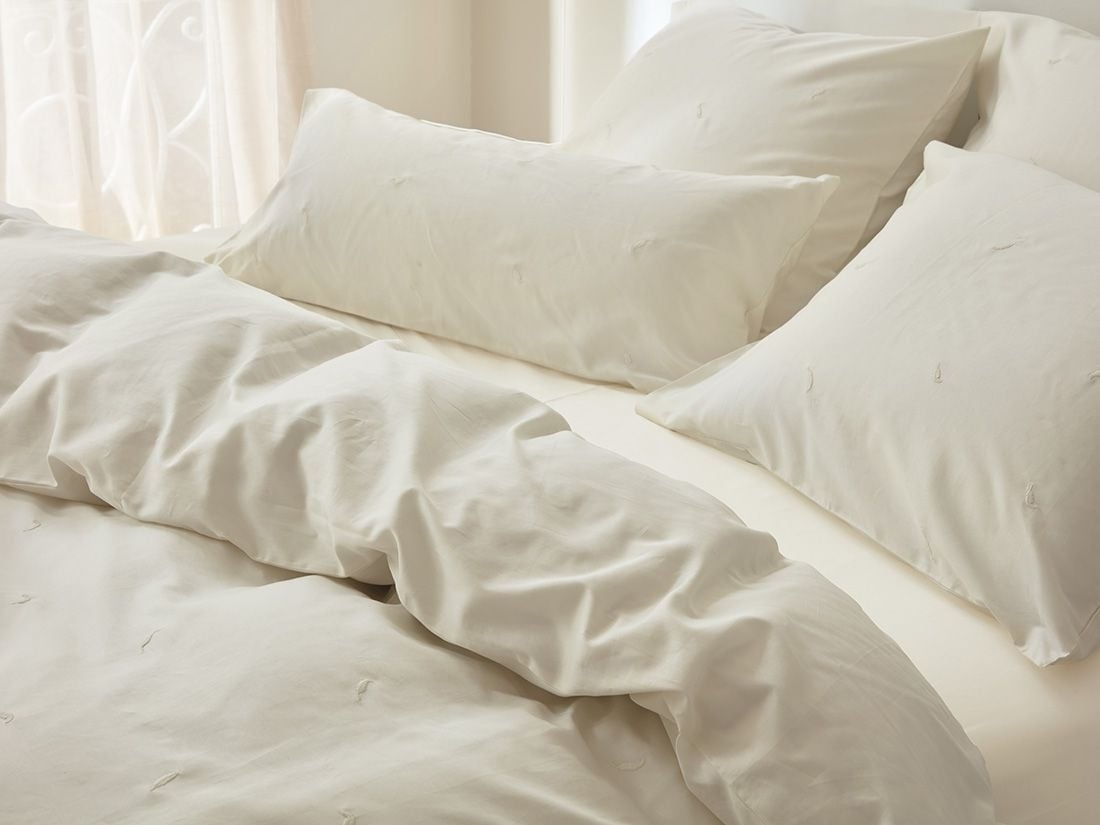 Örngott bomullssatin warm white feather